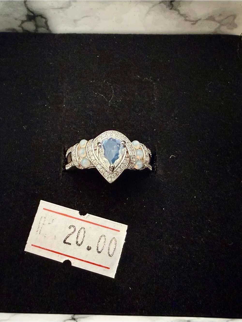 Silver Teardrop Clear Stone Ring with Opal Accents